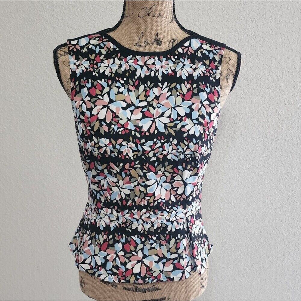 Anne Klein floral cottage structured peplum‎ top size 4